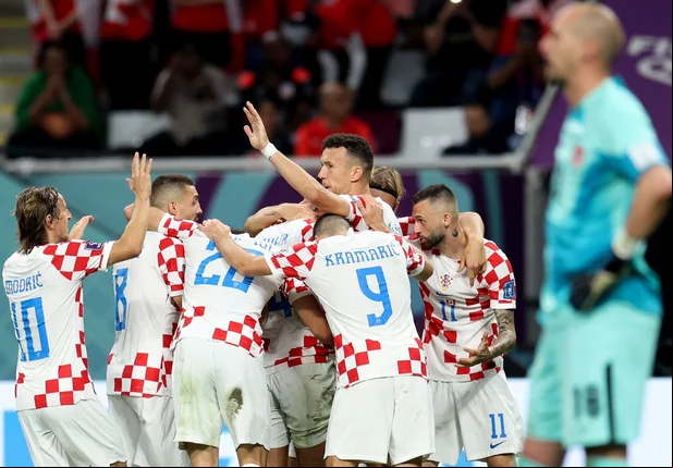 Cróacia comemorando gol diante do Canadá na Copa do Mundo