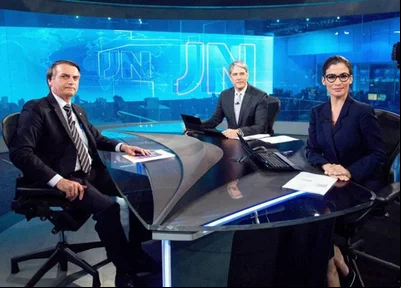Bolsonaro com Bonner e Renata Vanconcellos em 2018, no Jornal Nacional