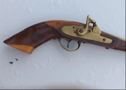 arma de fogo encontrada com o acusado